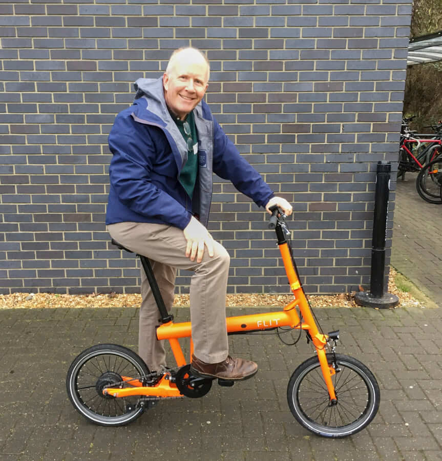 Quentin test riding the FLIT-16 folding ebike