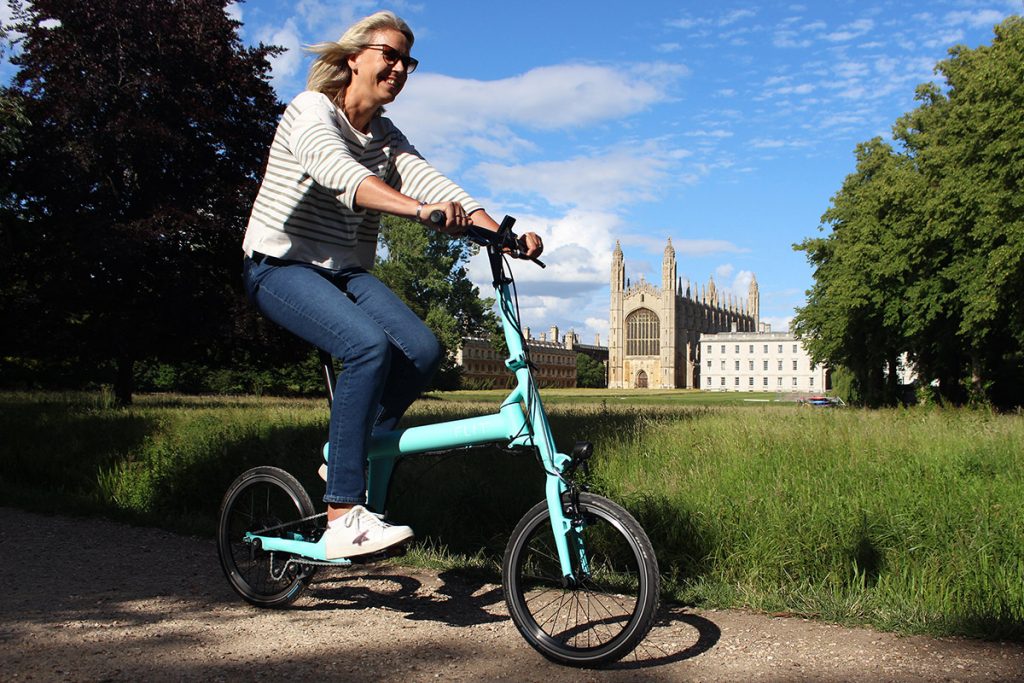 FLIT-16 lightweight folding ebike, riding past Kings College