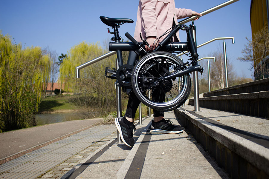 Carrying the FLIT-16 folding ebike
