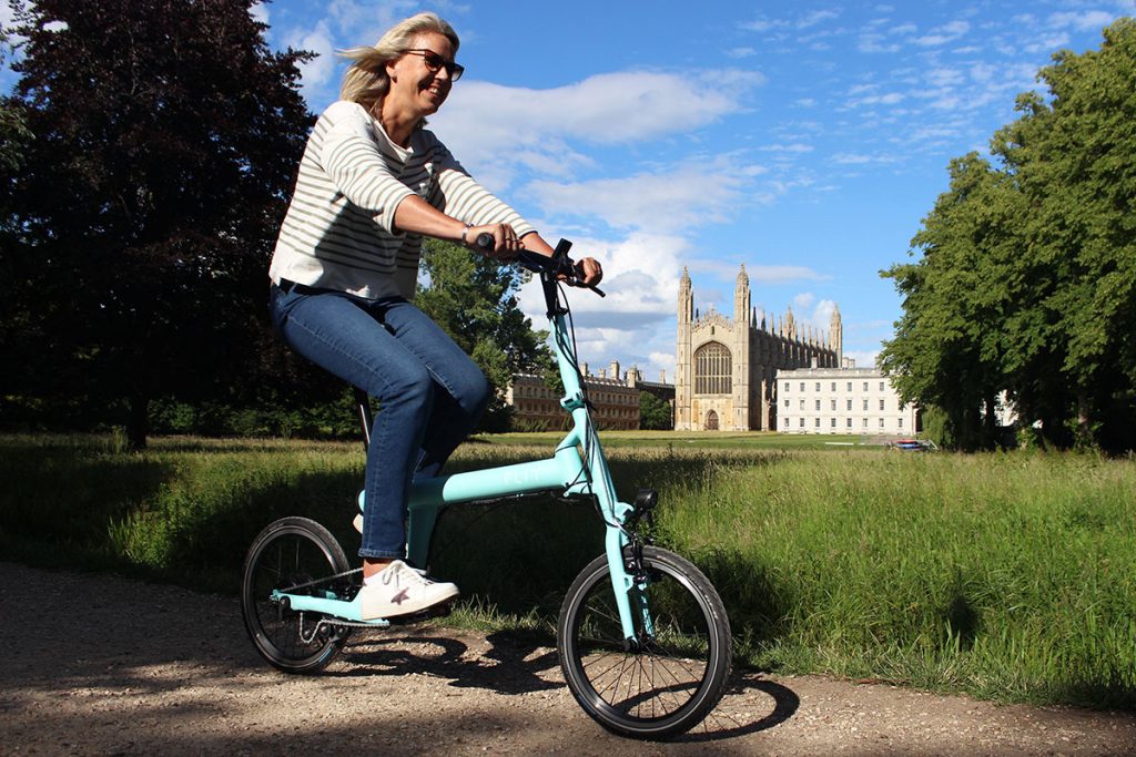 FLIT lightweight folding ebikes - Maya riding Kings College