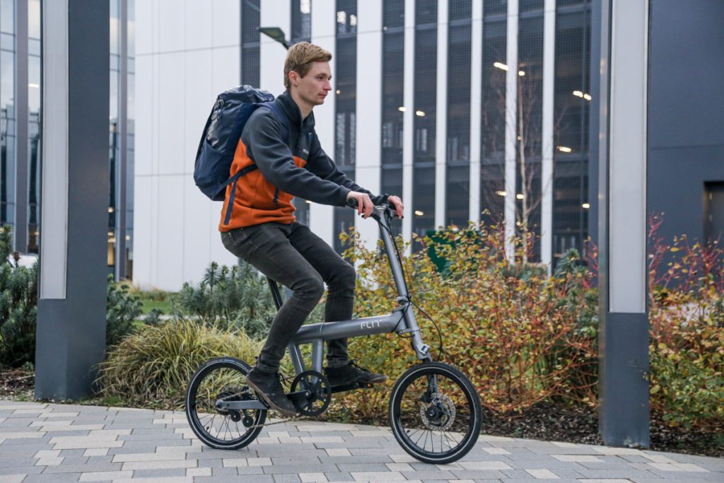 FLIT folding ebike being ridden at Cambridge Science Park